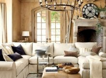 modern living room with beige furniture amd black cushions