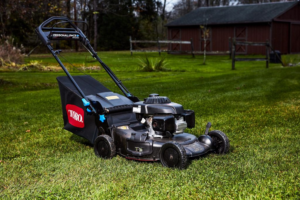 Gas mower in the grass
