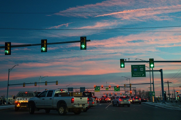 Image of a busy intersection with traffic lights
