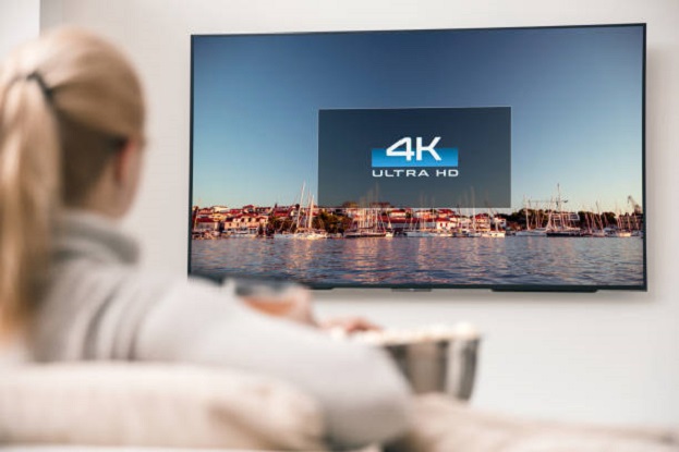 woman watching television in 4k