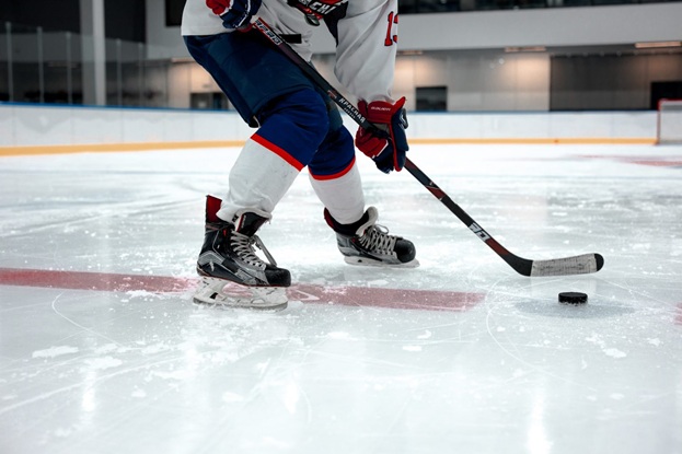 close up of hockey player playing