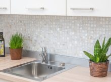 kitchen with glass mosaic tiles
